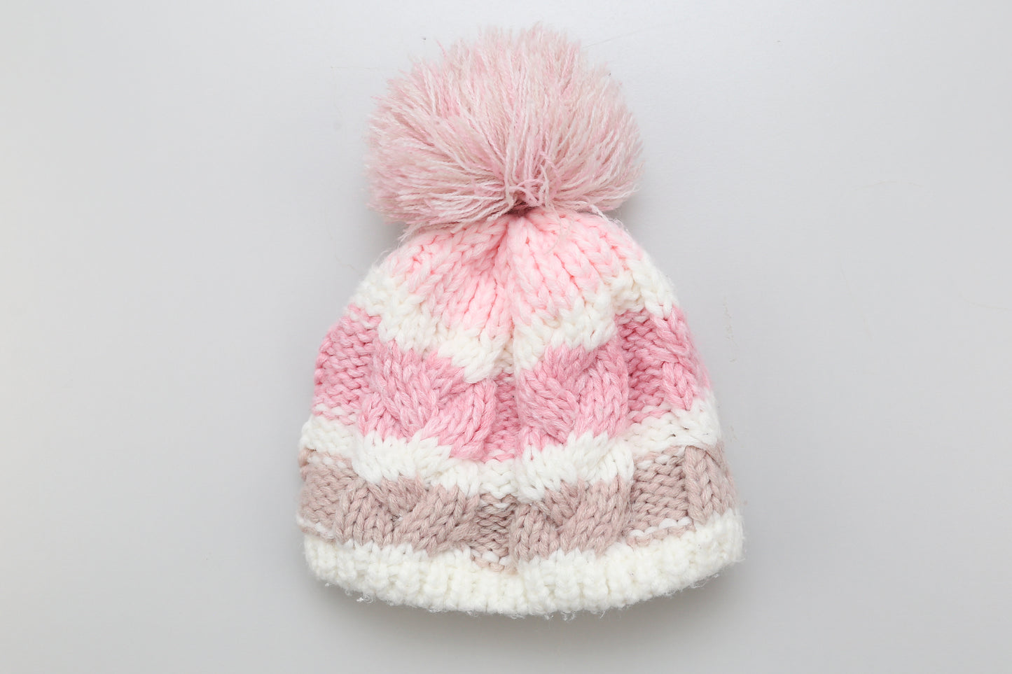 Gefütterte Strickmütze mit Bommel. 56-62