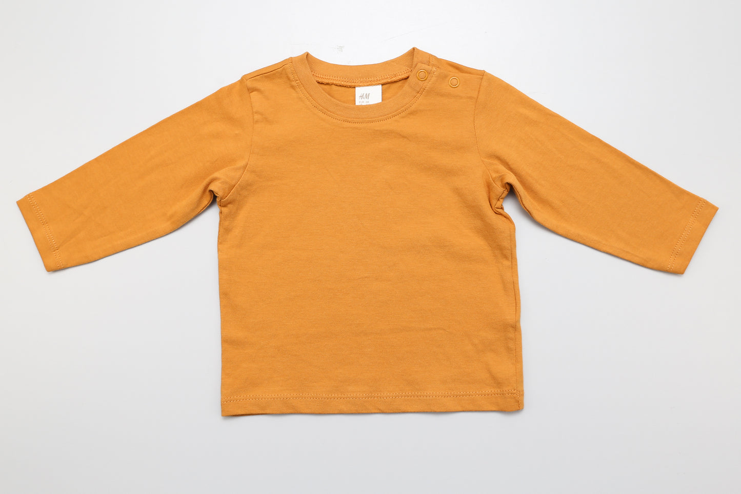 Senfgelbes Langarmshirt