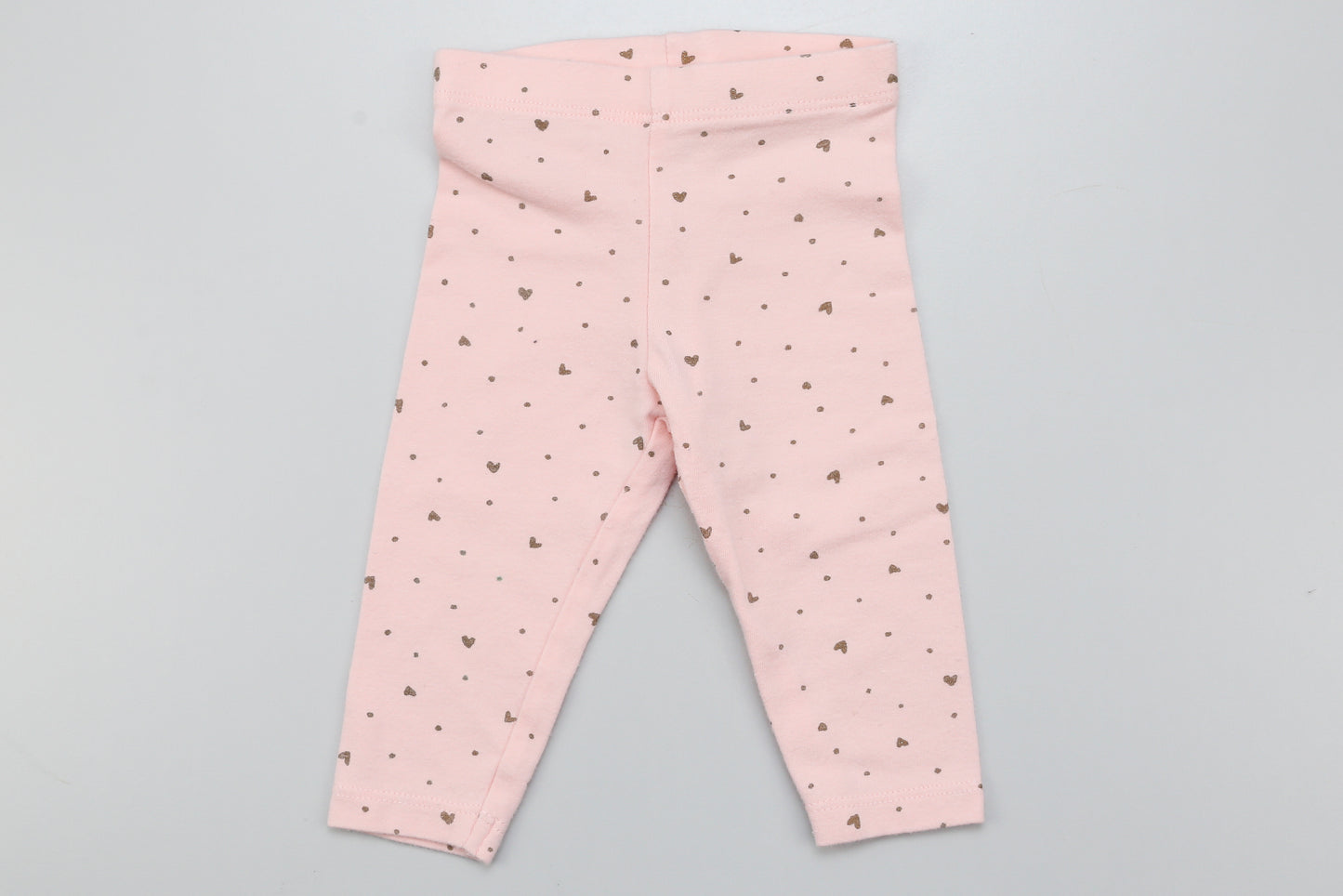 Rosa Leggings mit Herzmuster