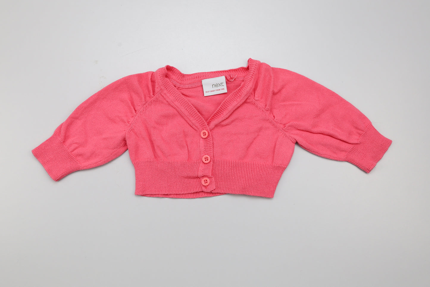 Dunkelrosa Baumwollcardigan mit Knöpfen vorne. - 74 gröe - Mädchen