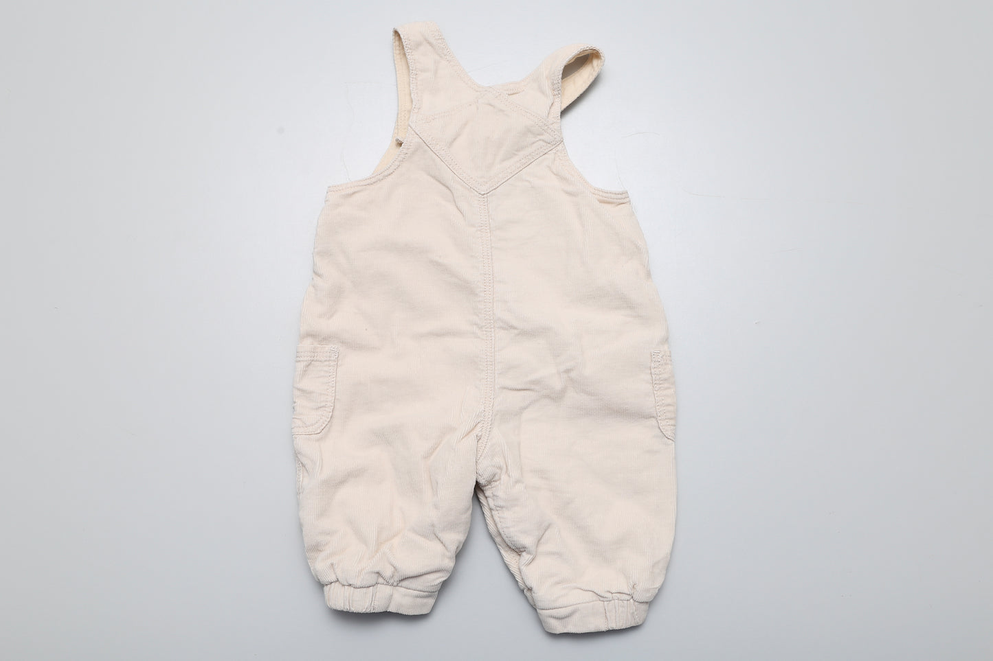 Beige gefütterte Latzhose aus Cordstoff (56)
