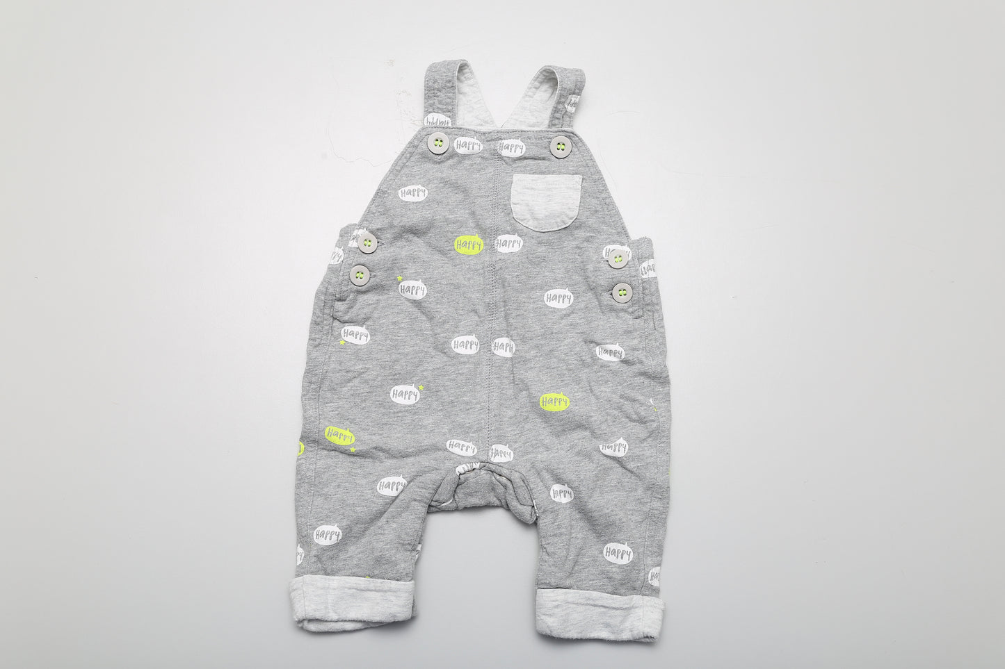 Graue Latzhose aus Baumwolle mit „Happy“-Aufschrift, Futter und verstellbaren Trägern. Größe 56.