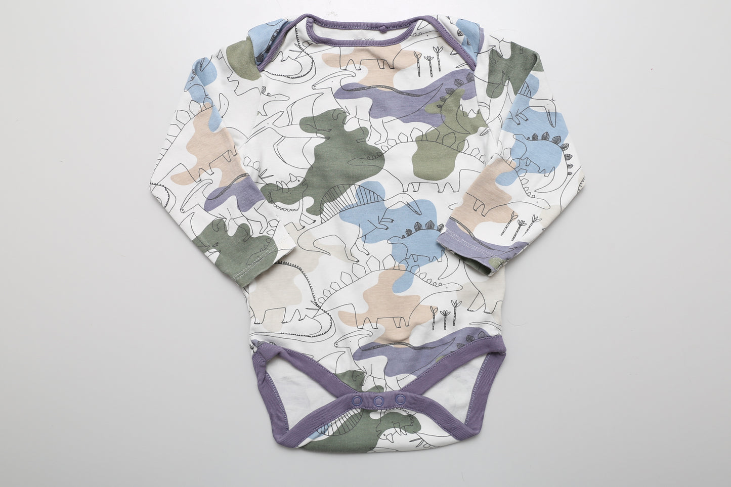 Bunter Langarm-Body mit Dino-Motiv. Aus 100 % Baumwolle, Größe 92.