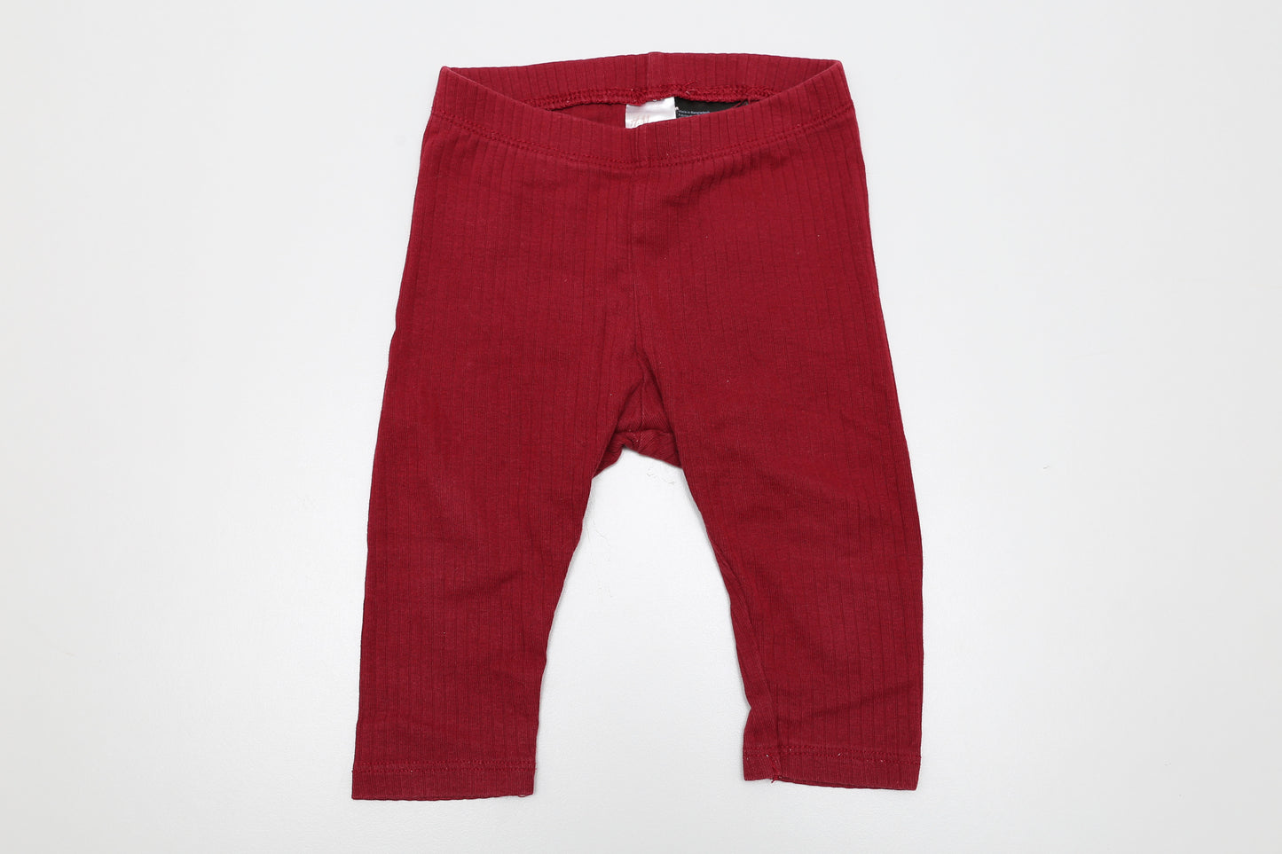 Bordeauxrote Leggings aus geripptem Stoff, neuwertig, Größe 68.