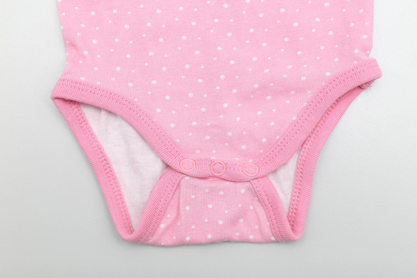 Rosa Langarmbody mit GOTS-Zertifikat (74-80)