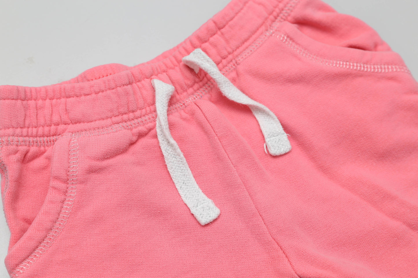Rosa Sweatpants mit flauschigem Innenfutter und Kordelzug, Größe 80.