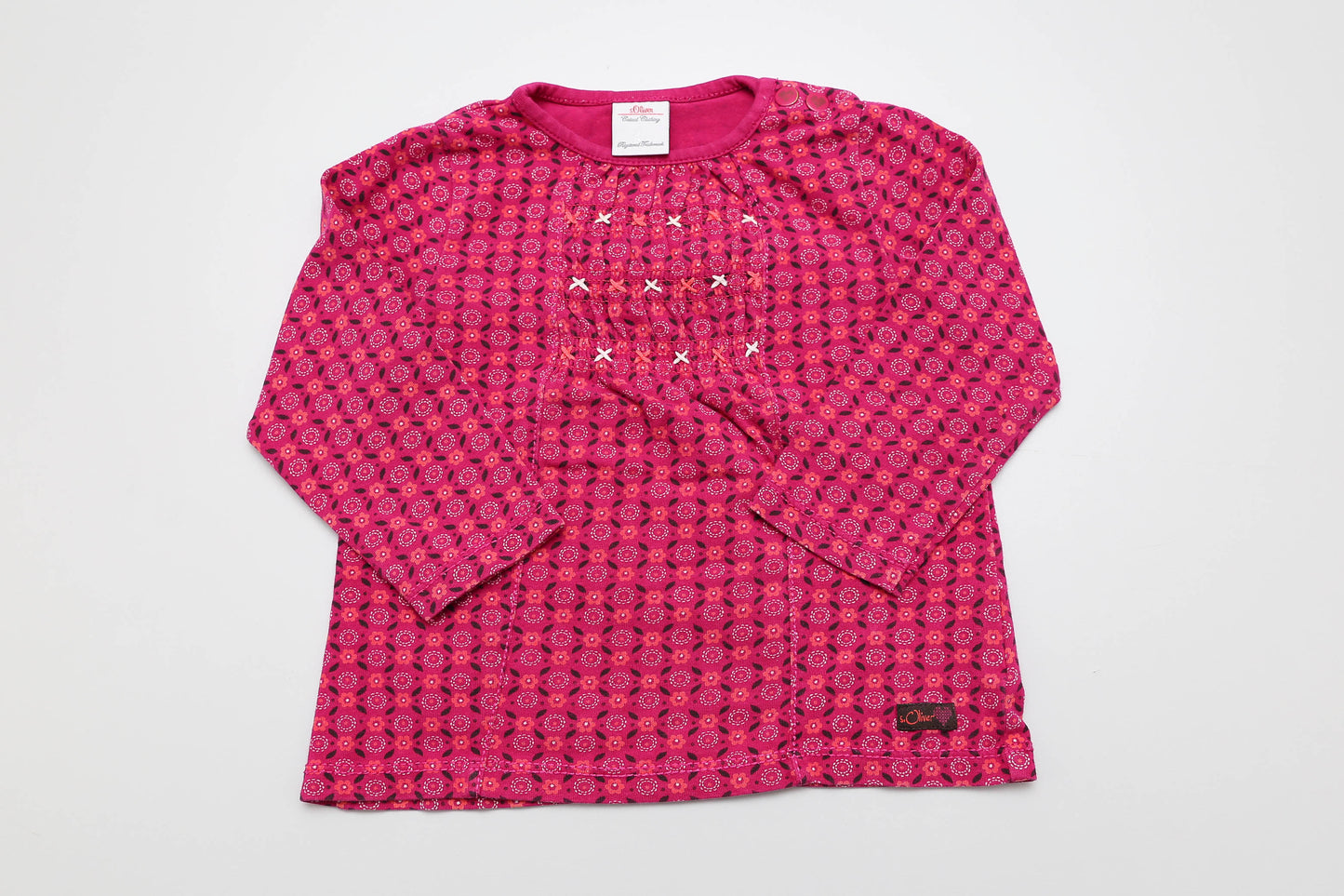 Wunderschöne rosa Tunika mit langen Ärmeln für kleine Mädchen in Größe 68. Aus 95 % Baumwolle und 5 % Elasthan – angenehm weich, elastisch, formstabil und ohne Pilling. Ideal für jeden Tag!