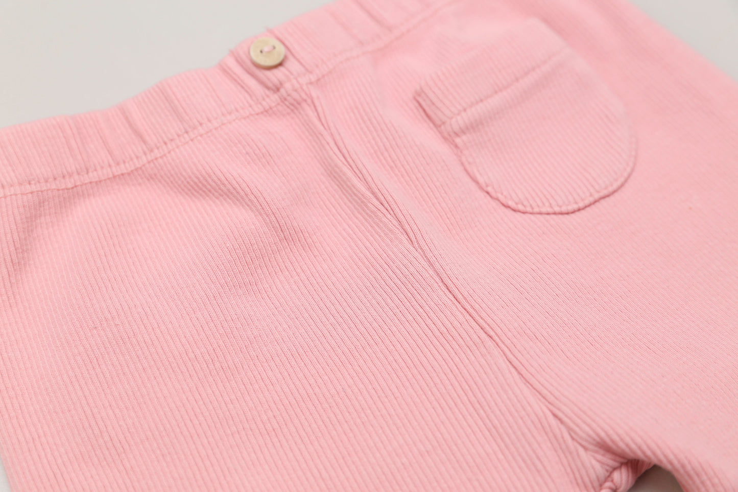 Rosa gerippte Leggings mit Zierknopf und Tasche (68)