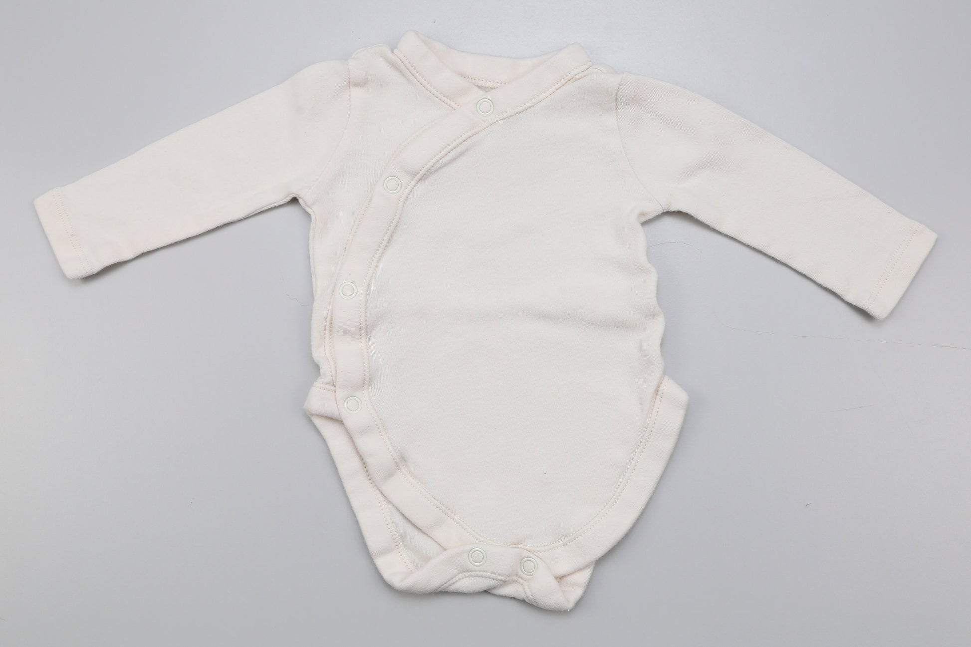 Eierschalenfarbener Wickelbody 56 62