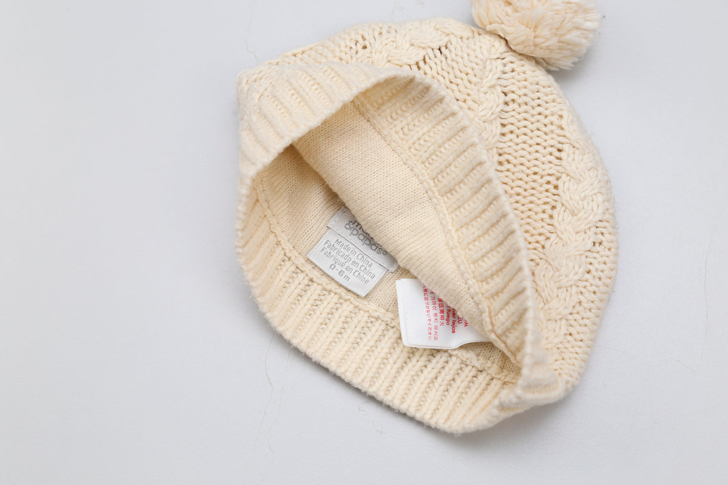 Gestrickte Beanie-Mütze mit Bommel (62-68) - KlugeMutti