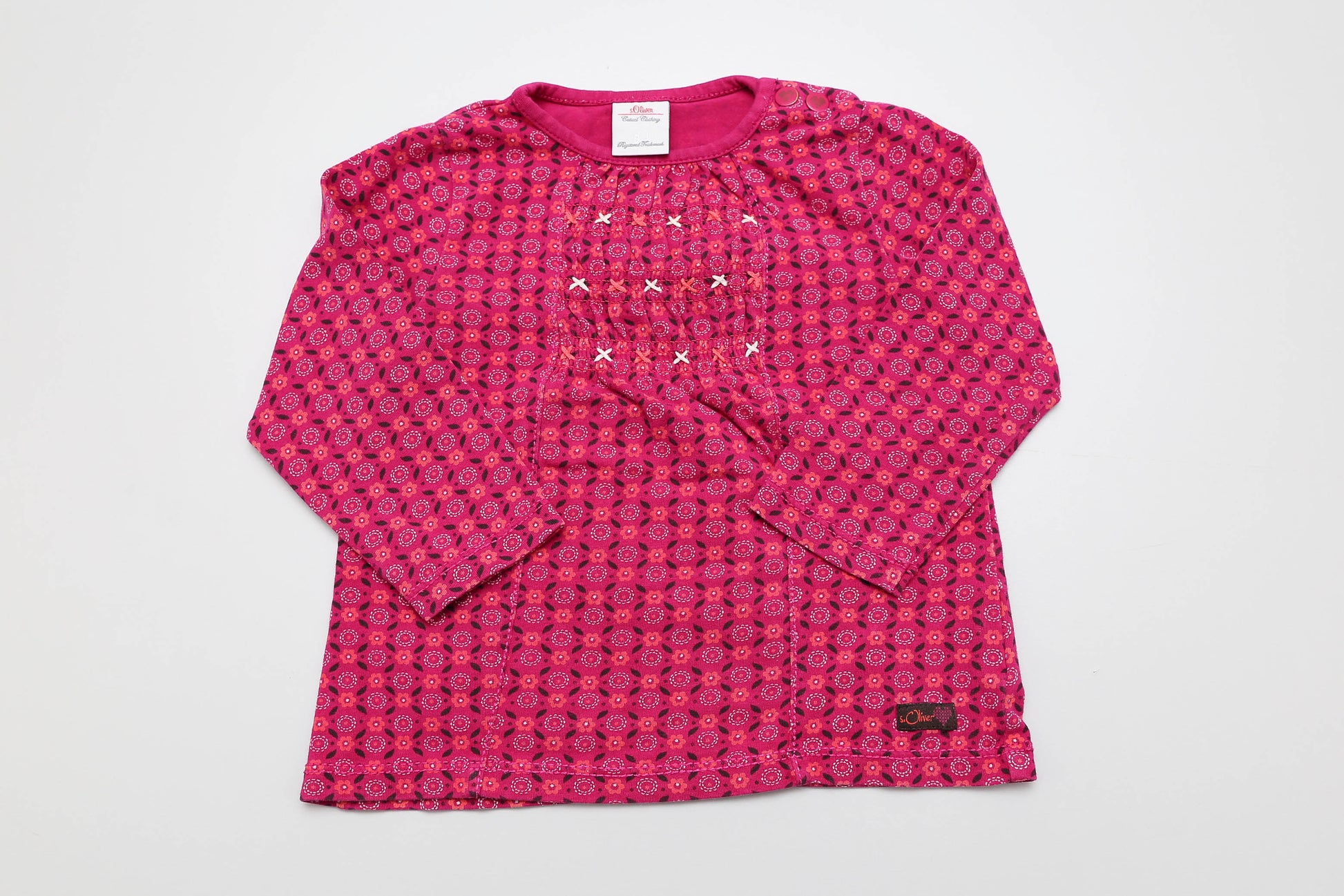Wunderschöne rosa Tunika mit langen Ärmeln für kleine Mädchen in Größe 68. Aus 95 % Baumwolle und 5 % Elasthan – angenehm weich, elastisch, formstabil und ohne Pilling. Ideal für jeden Tag!